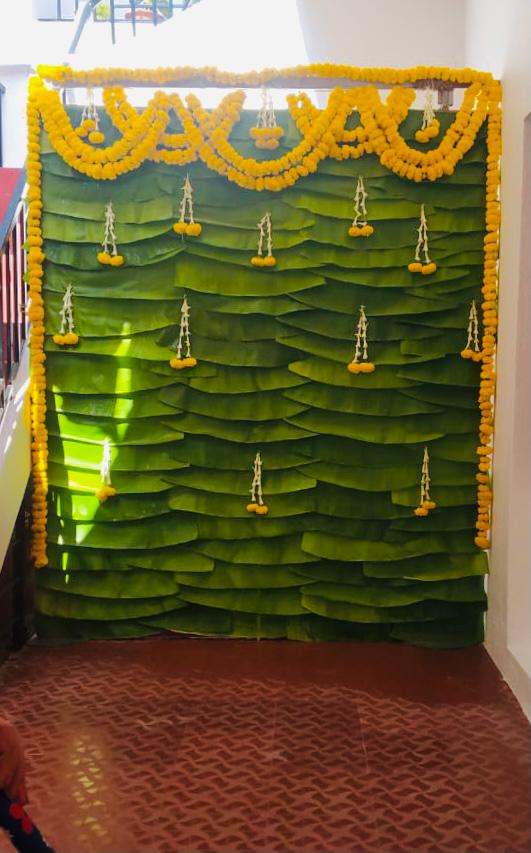 Simple Yellow Marigold and Banana Leaf decoration