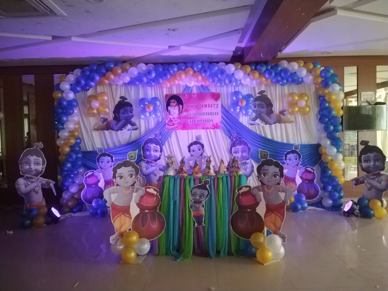 Krishna-Themed Blue, White and Yellow Balloon Decoration