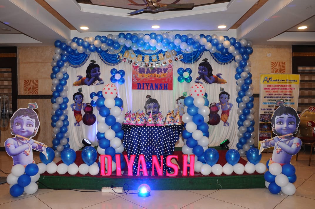Krishna-Themed Metallic Blue and White Balloon Decoration