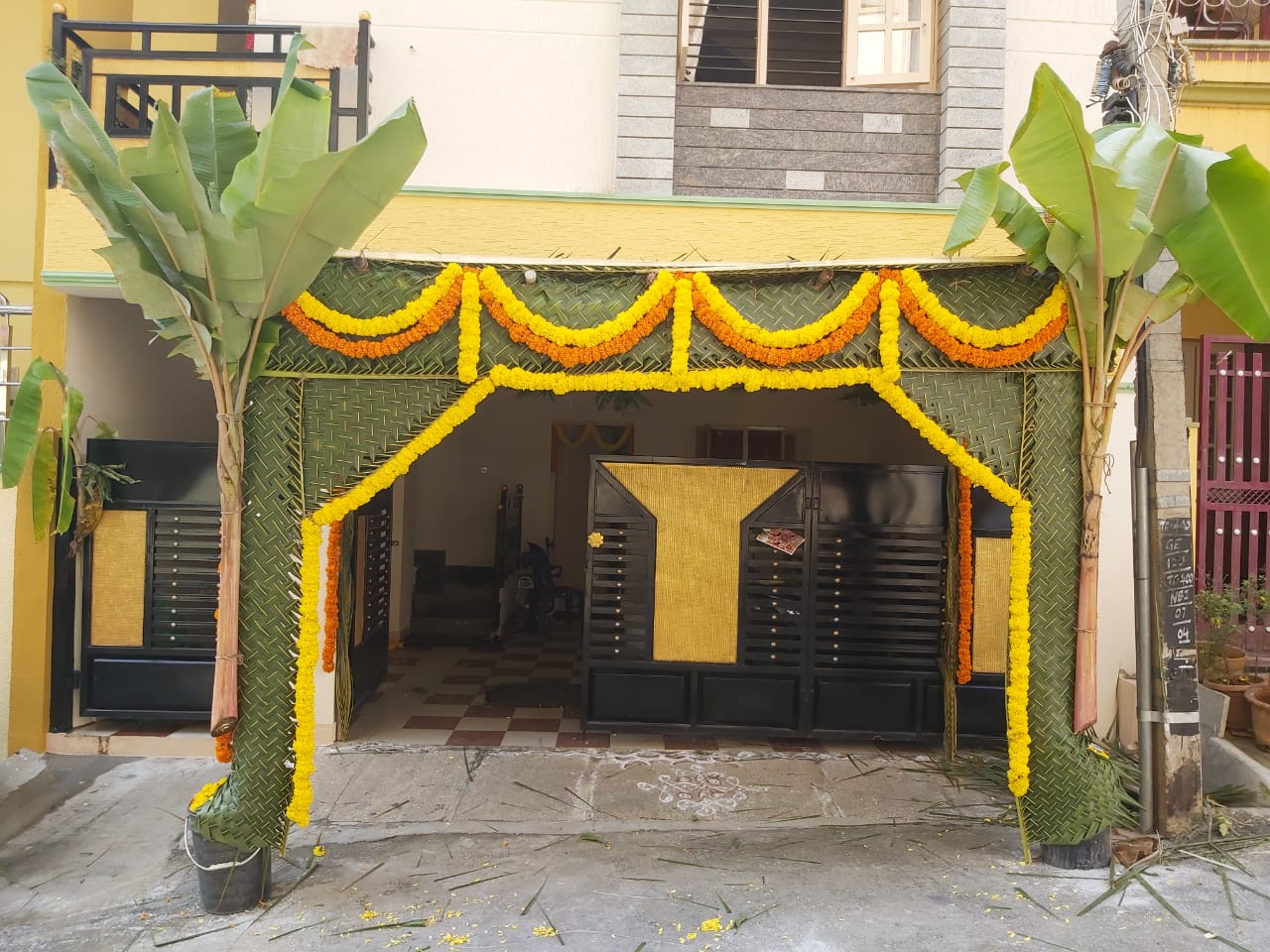 Orange and Yellow Marigold and Coconut Leaves Decoration