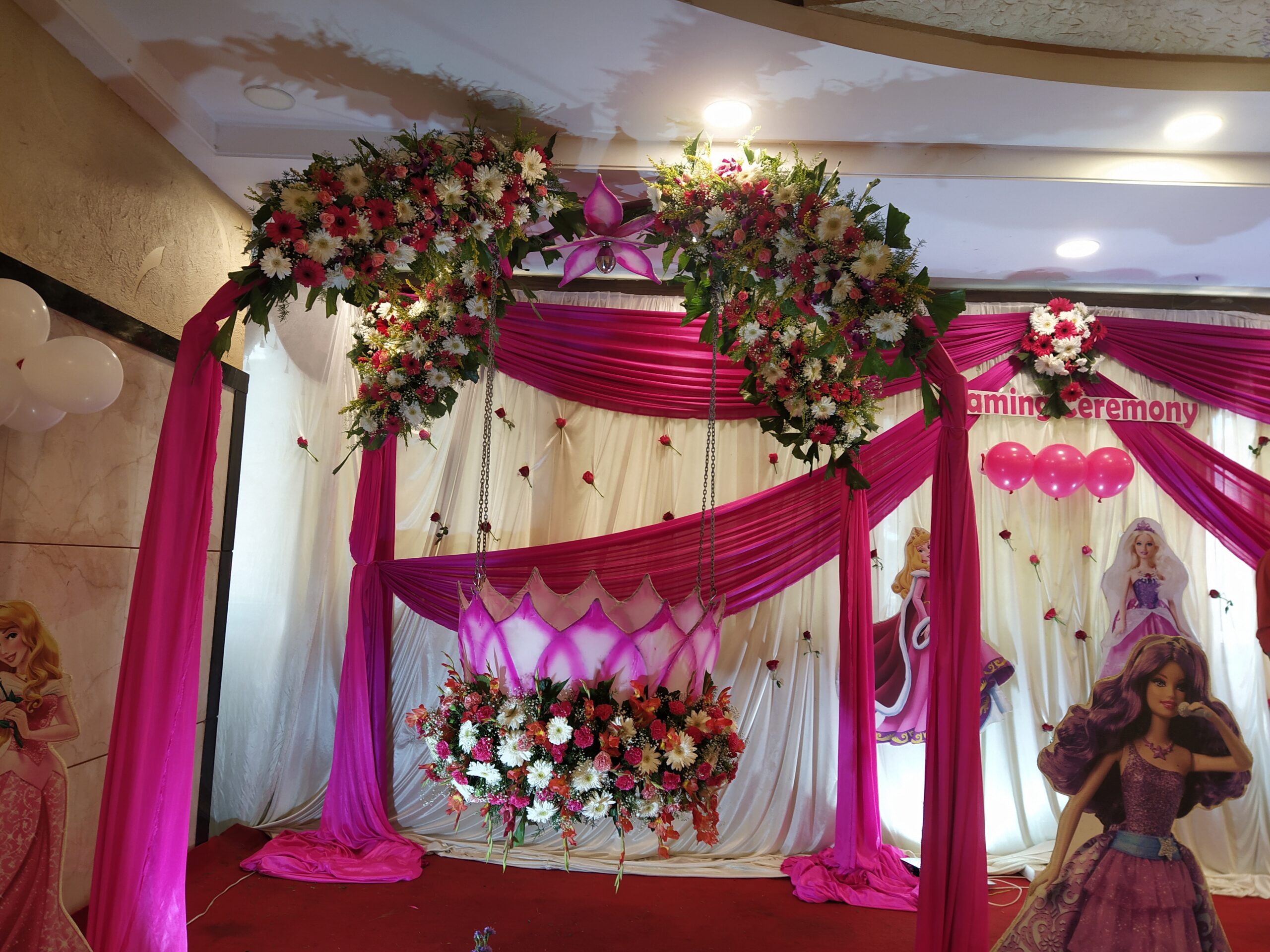 Barbie- themed floral decor for Naming Ceremony