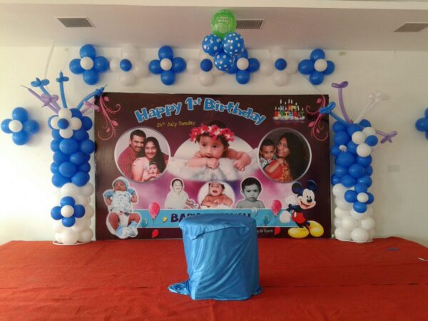 Blue and White Balloons and Huge Banner Decoration