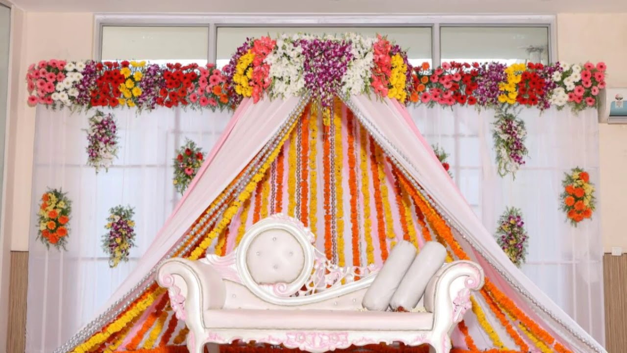 Orange and Yellow Mari gold and Multicoloured Gerbera Decoration