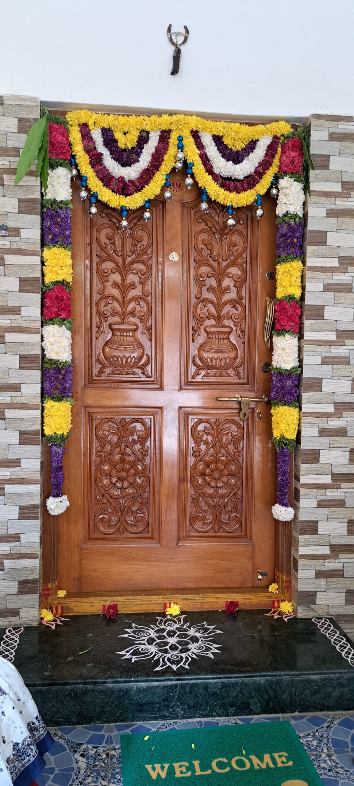 Simple Entrance Decor with Variety of Flowers