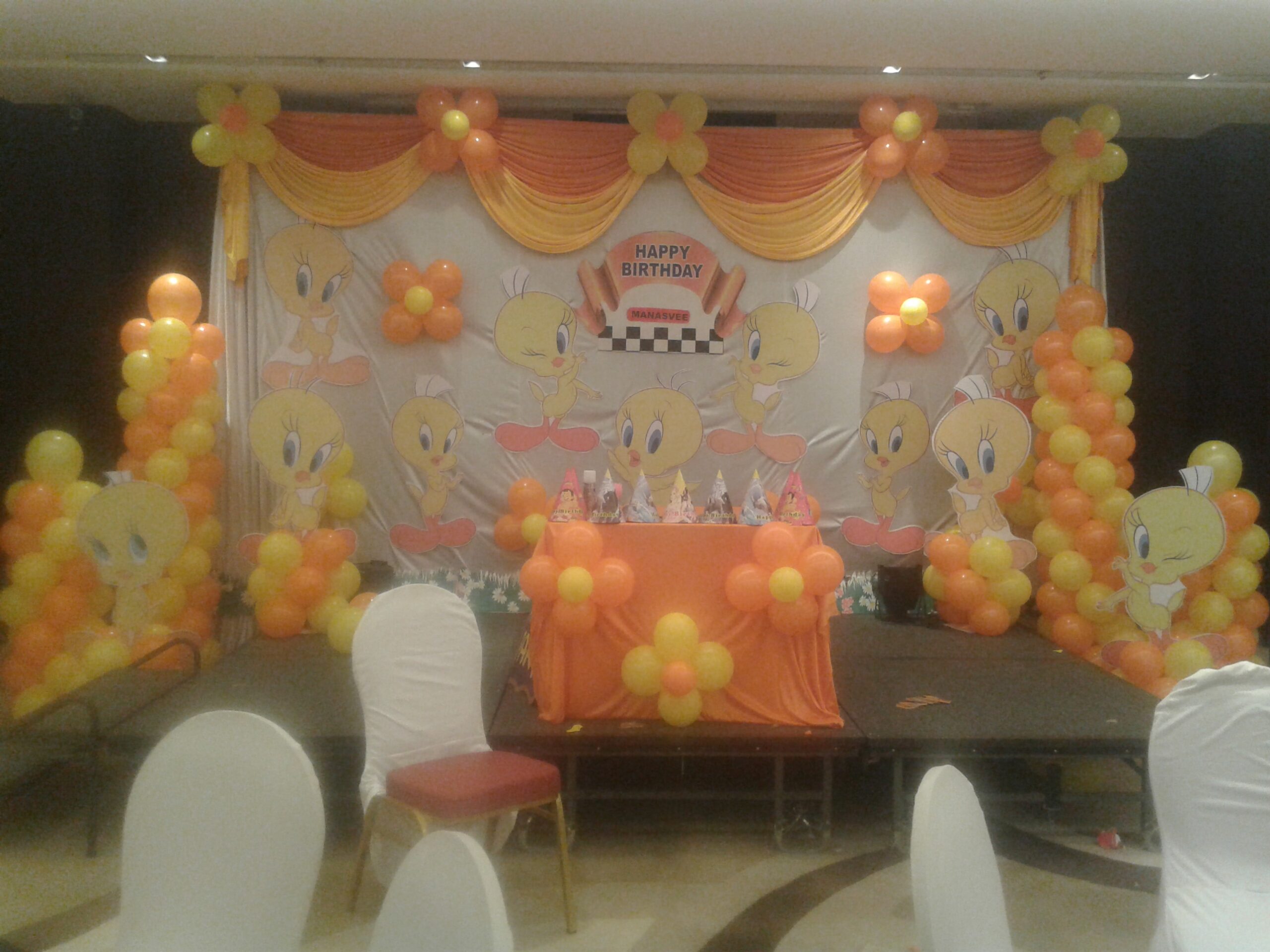 Cartoon-themed Orange and Yellow balloon Decor